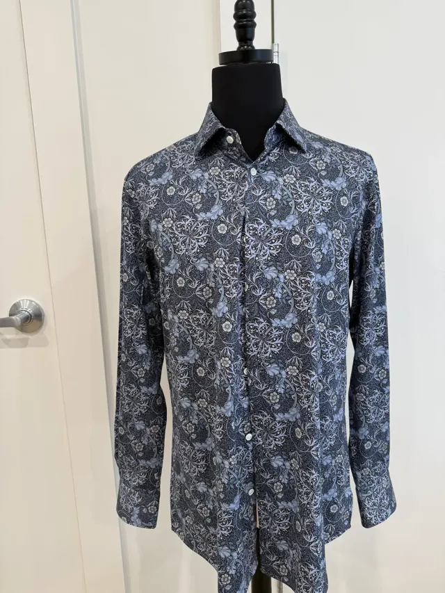Custom blue floral shirt on a tailor's dress form